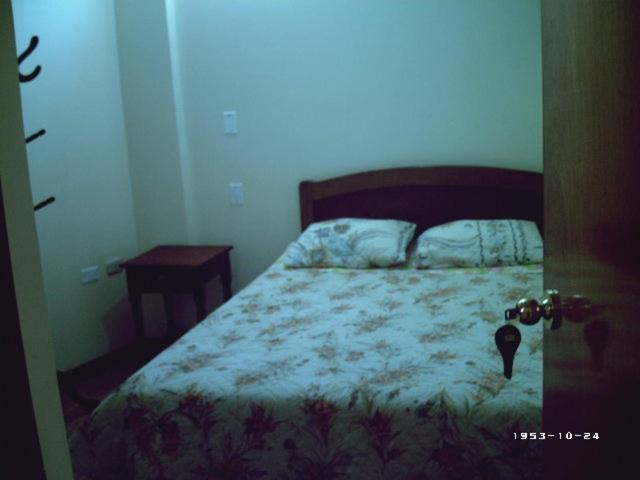 Postel nebo postele na pokoji v ubytování Hostel Puno Backpackers