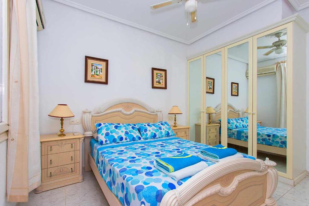 Postel nebo postele na pokoji v ubytování CH Villa Sola Ciudad Quesada