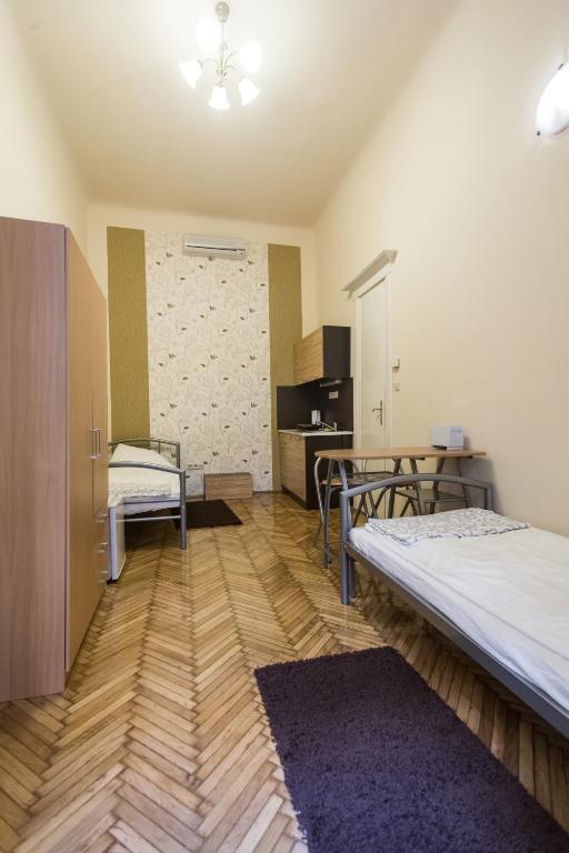 Posteľ alebo postele v izbe v ubytovaní Riverside City