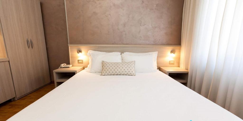 Postel nebo postele na pokoji v ubytování Hotel Lis