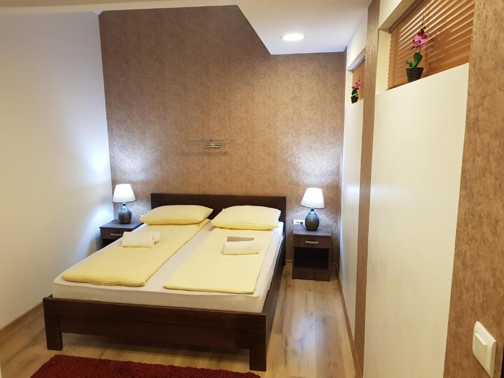 Postel nebo postele na pokoji v ubytování B&B Bazeni