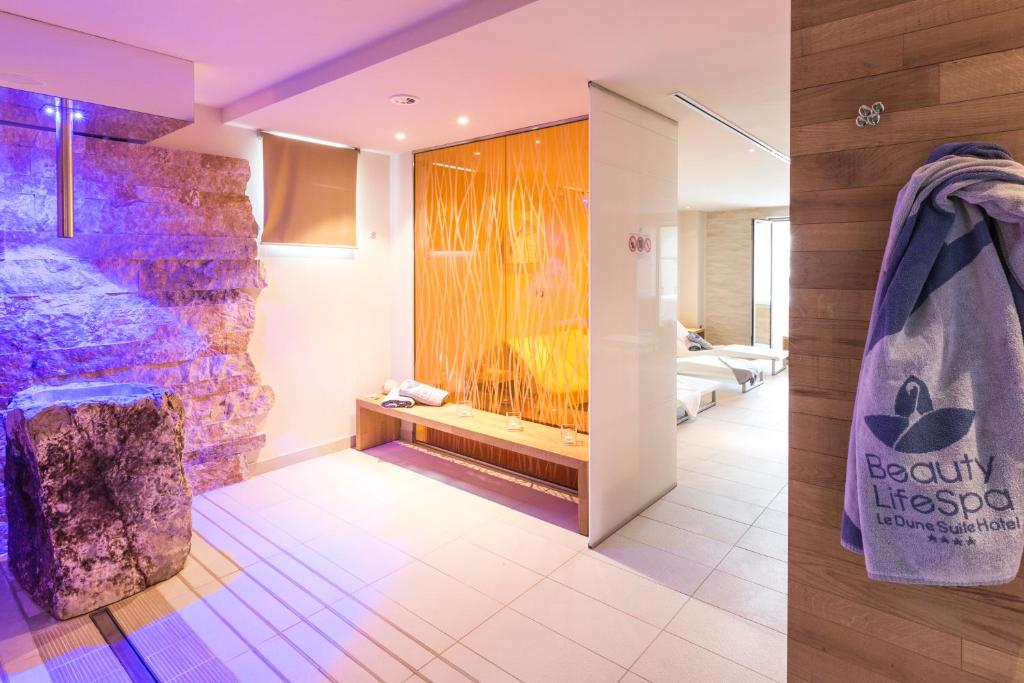 Kúpeľňa v ubytovaní Le Dune Suite Hotel