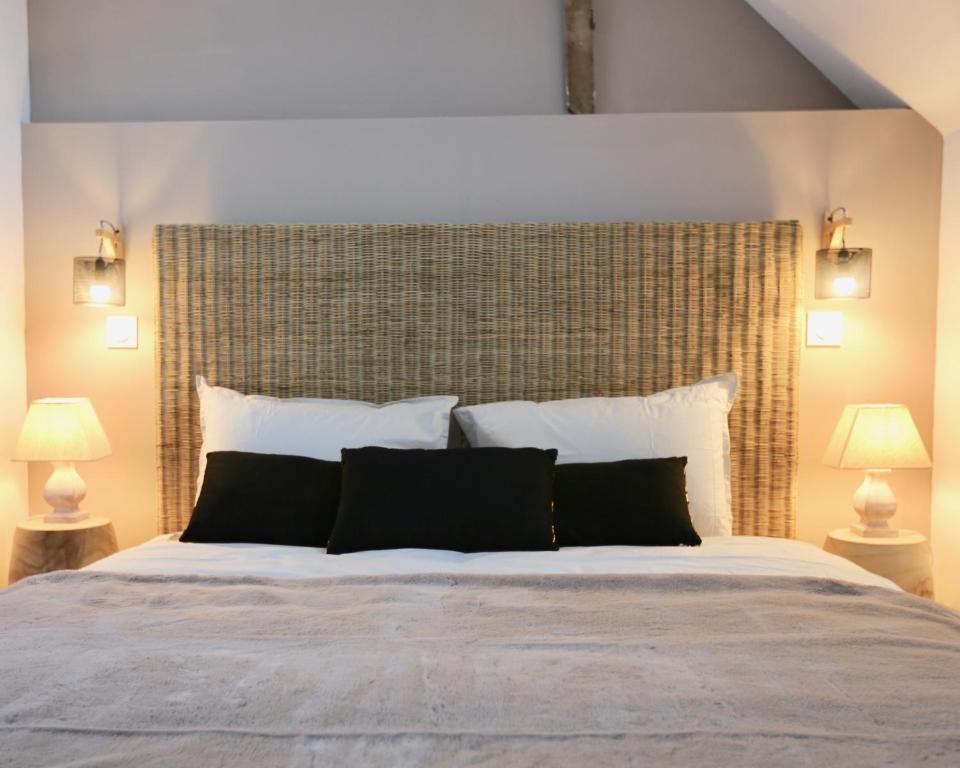 Postel nebo postele na pokoji v ubytování Les Maisons du Périgord" Coté Malpas"