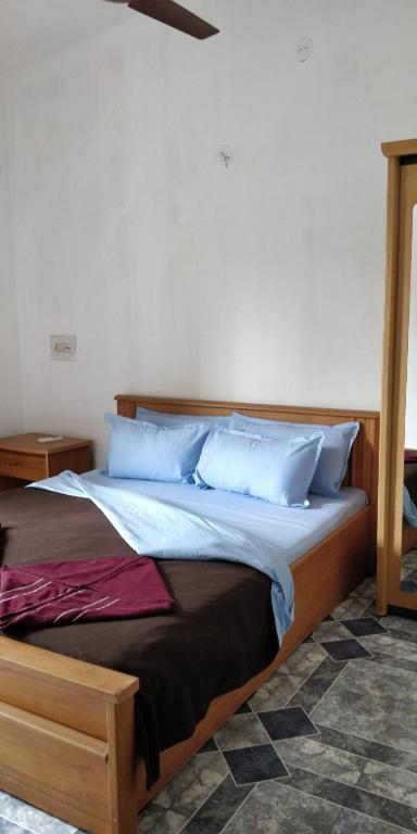 Postel nebo postele na pokoji v ubytování Koito-House calangute guest house