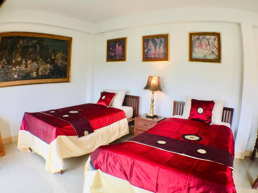 Postel nebo postele na pokoji v ubytování Gumbie House