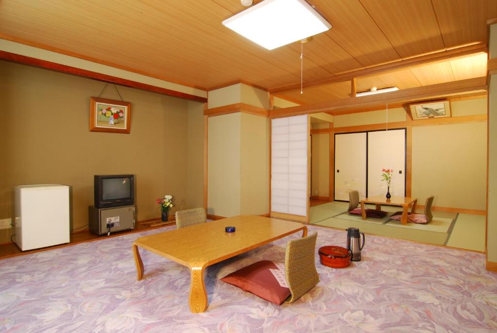TV a/nebo společenská místnost v ubytování Shiga No Yu Hotel
