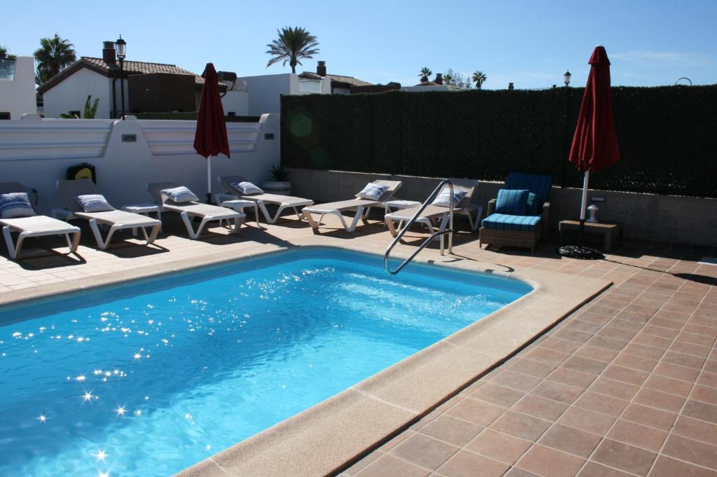 Bazén v ubytování VILLA DREAMS - VILLAS LA ESTANCIA - nebo v jeho okolí