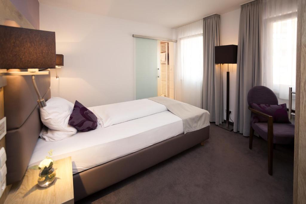 Postel nebo postele na pokoji v ubytování DasSchaffers - MeinWohlfühlhotel