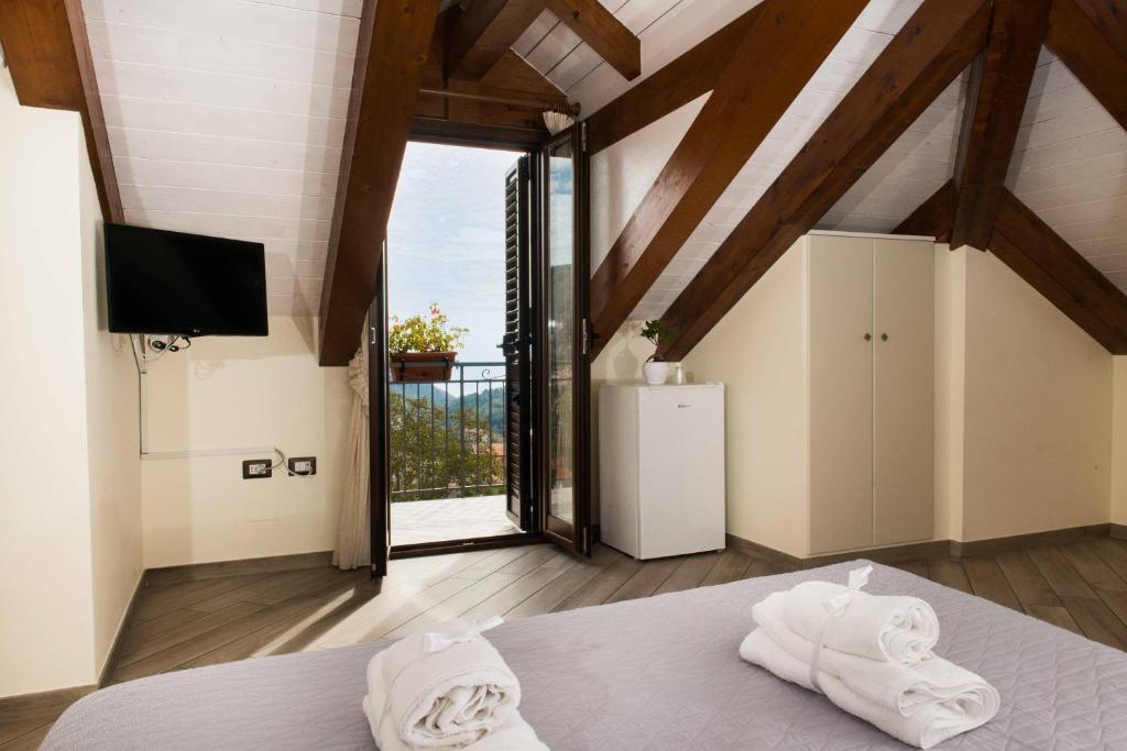 TV a/nebo společenská místnost v ubytování B&B Kebontà