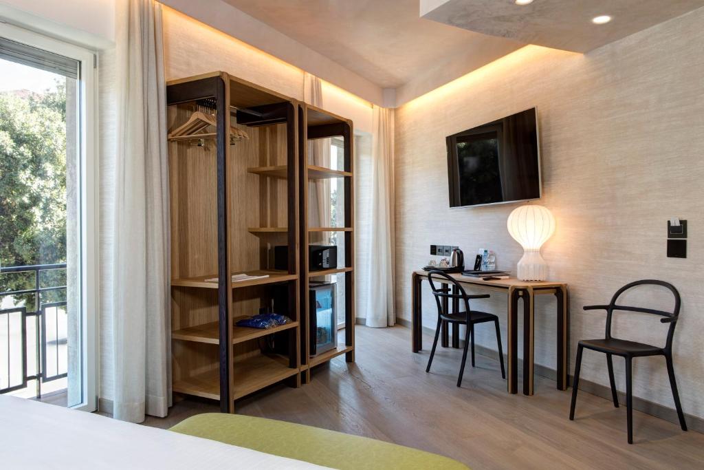 TV a/nebo společenská místnost v ubytování Hotel Firenze