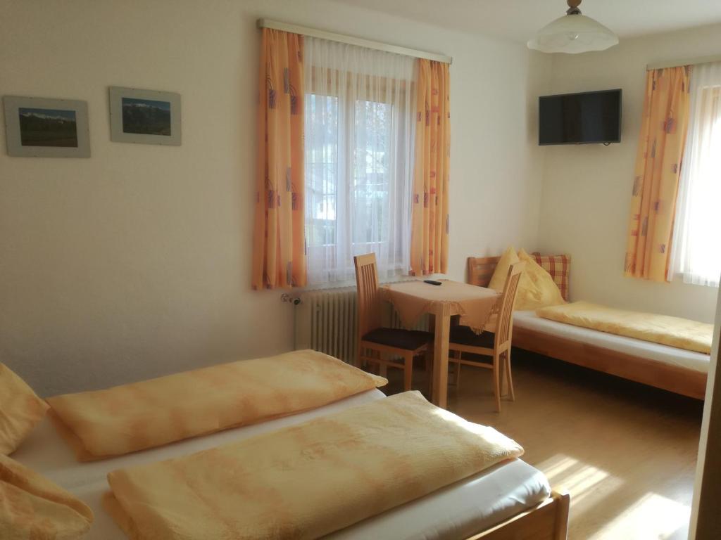 Postel nebo postele na pokoji v ubytování Lasserhof