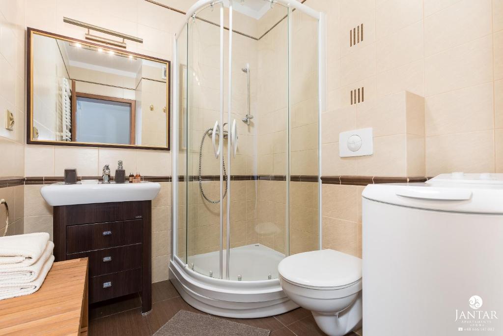 Kúpeľňa v ubytovaní Jantar Apartamenty- Zielone Tarasy