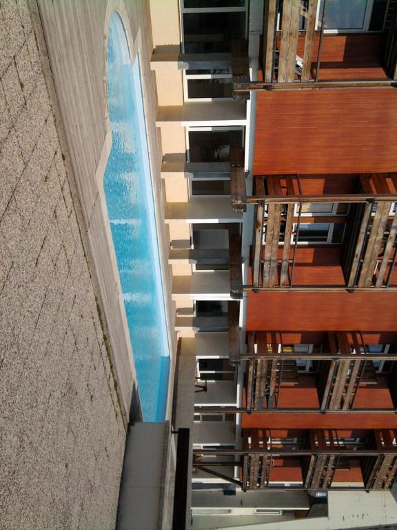 an overhead view of a pool in a building at Appartements Le Clos des Gentianes in Allevard