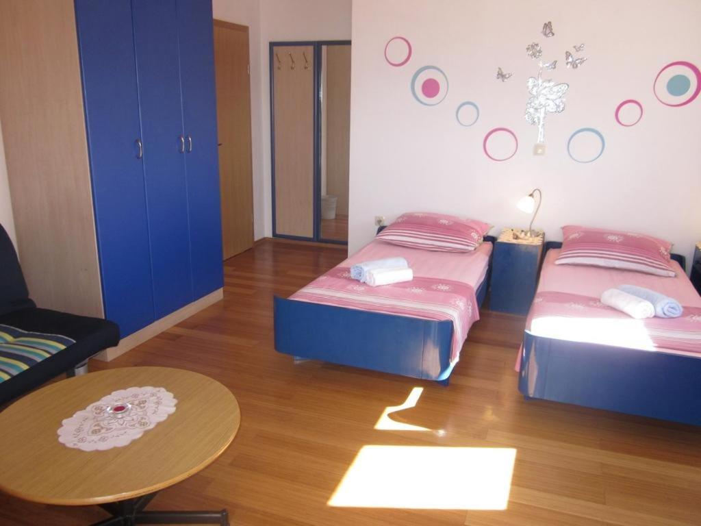 Posteľ alebo postele v izbe v ubytovaní Apartment in Hvar town with sea view, terrace, air conditioning, Wi-Fi (3666-4)