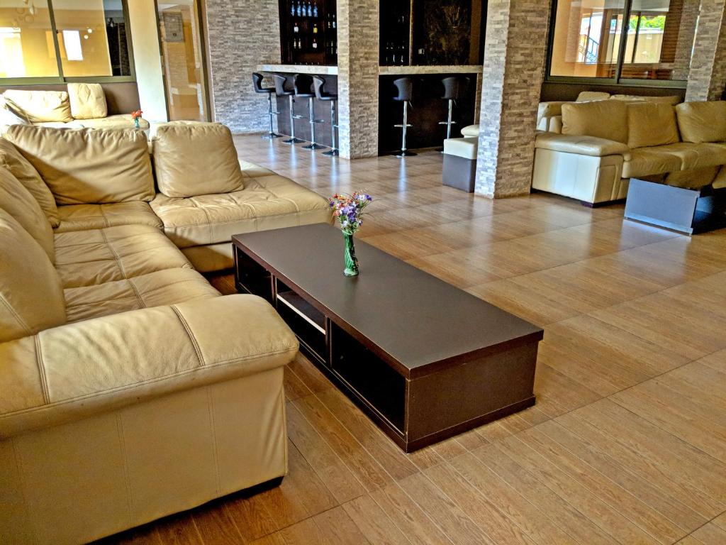 Posezení v ubytování Prestige Hotel Suites