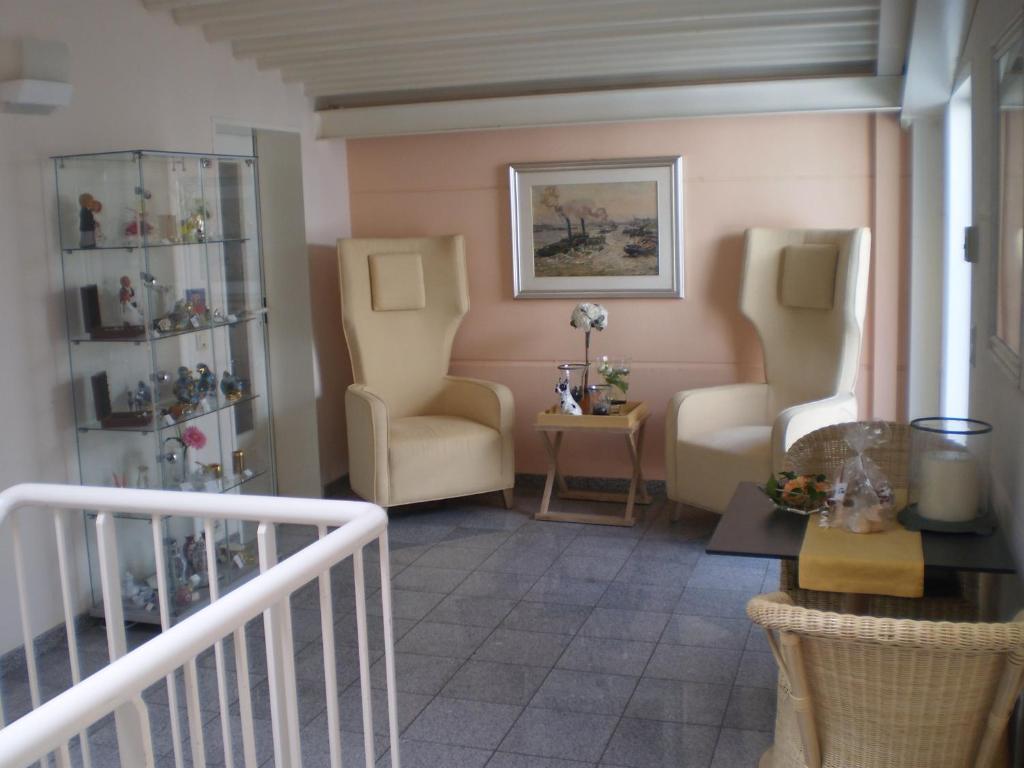 Posezení v ubytování Lindemann Hotel