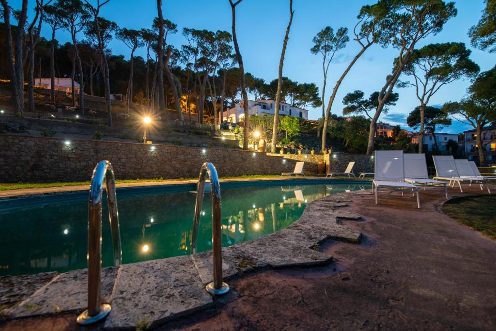 Bazén v ubytovaní El Portió, tu casa de ensueño junto a la playa. alebo v jeho blízkosti