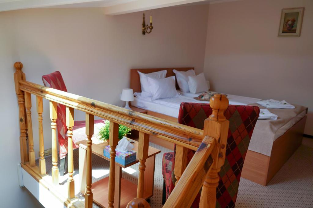 Letto o letti in una camera di Bucharest Downtown Inn