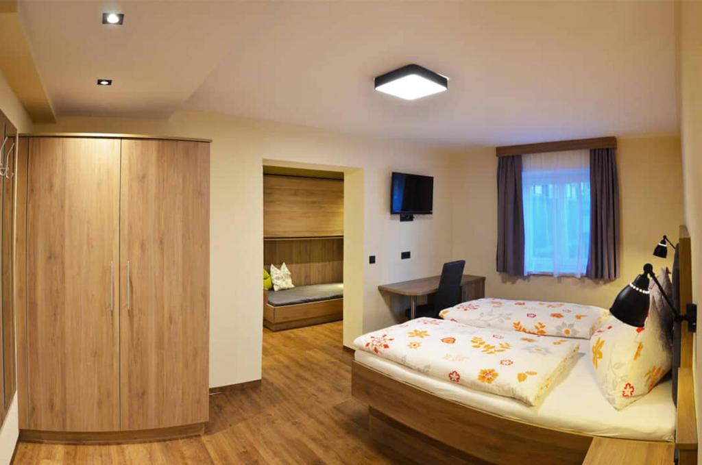 Ένα ή περισσότερα κρεβάτια σε δωμάτιο στο Die Reinbachstube