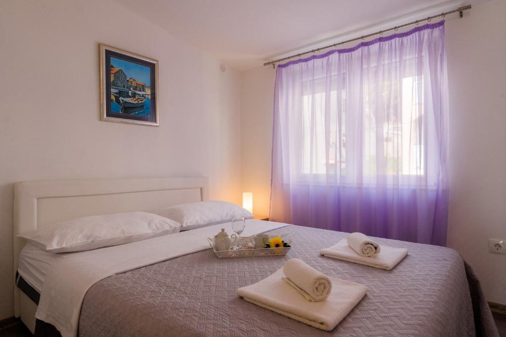 Postel nebo postele na pokoji v ubytování La Bodega Apartments