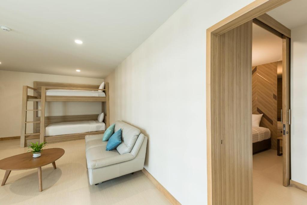 Postel nebo postele na pokoji v ubytování Paragon Grand Resort