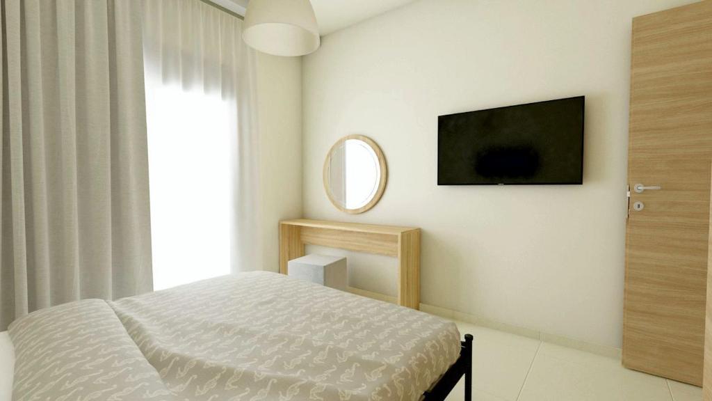 Postel nebo postele na pokoji v ubytování luxury - comfy center rodos