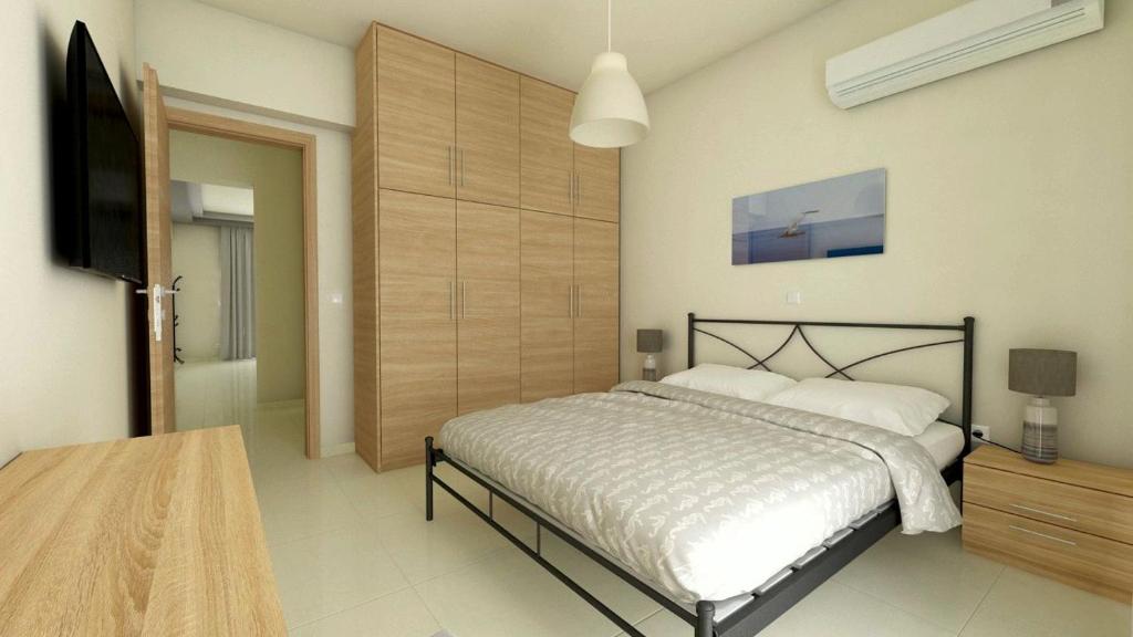 Postel nebo postele na pokoji v ubytování luxury - comfy center rodos