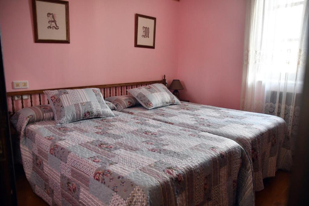 Postel nebo postele na pokoji v ubytování Hotel Rural Molino del Arriero