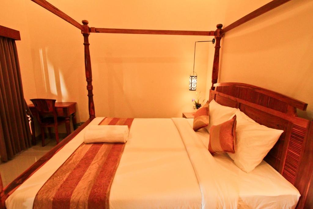 Postel nebo postele na pokoji v ubytování Awan Bali House