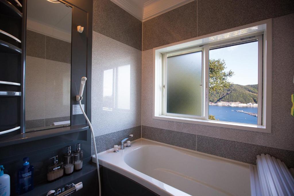 Fotografie z fotogalerie ubytování Tsubaki House v destinaci Anan
