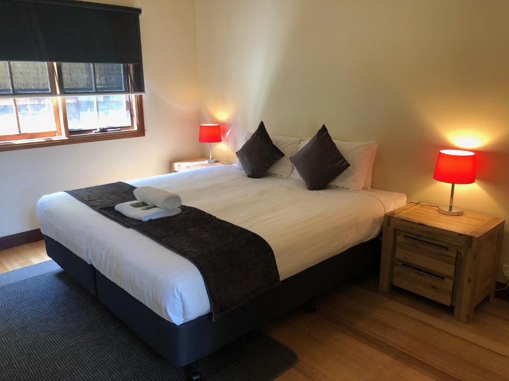 Postel nebo postele na pokoji v ubytování Riverglen Chalets
