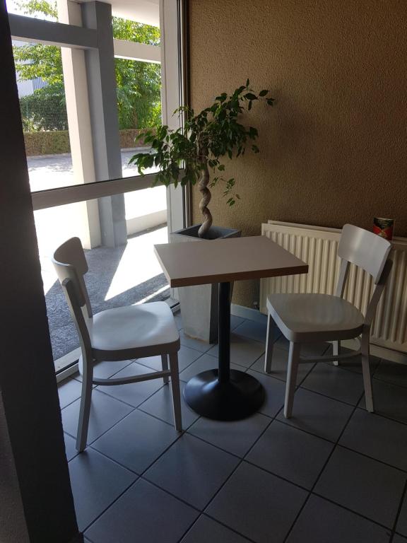 Posezení v ubytování B&B HOTEL Valence Nord
