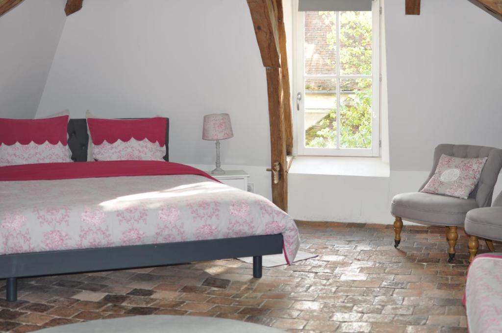 Postel nebo postele na pokoji v ubytování B&B Le Relais des Saints Pères