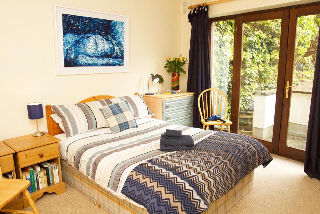 Кровать или кровати в номере Kieran's Place