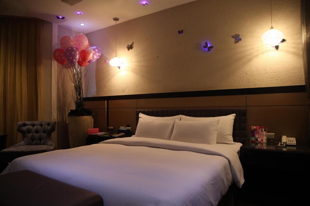 Letto o letti in una camera di Go Shine Motel