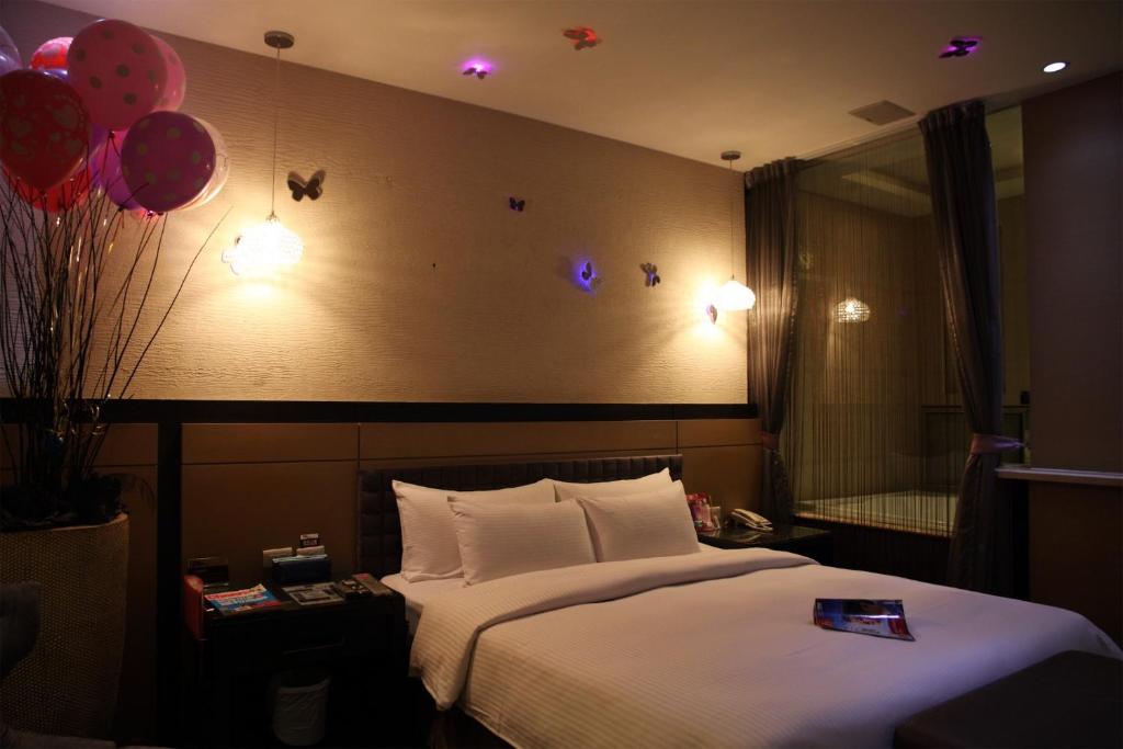 Letto o letti in una camera di Go Shine Motel