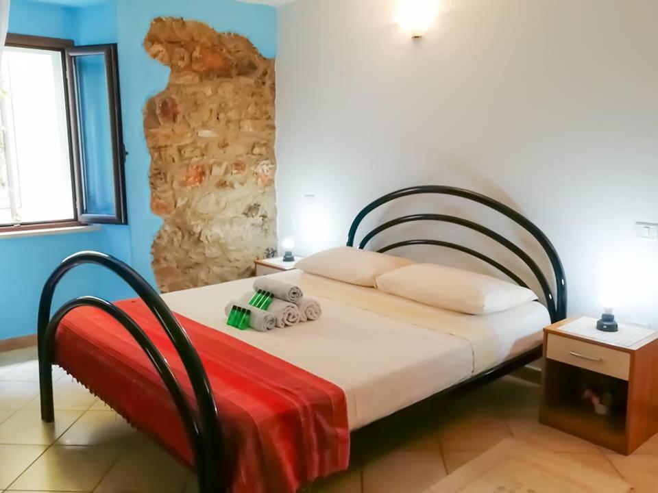 Ένα ή περισσότερα κρεβάτια σε δωμάτιο στο Albus Guest House