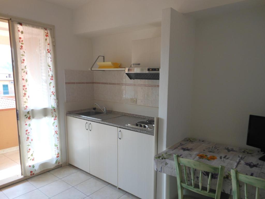Kuchyň nebo kuchyňský kout v ubytování Hotel Due Torri