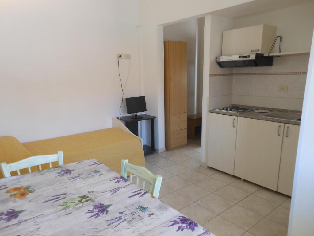 Kuchyň nebo kuchyňský kout v ubytování Hotel Due Torri