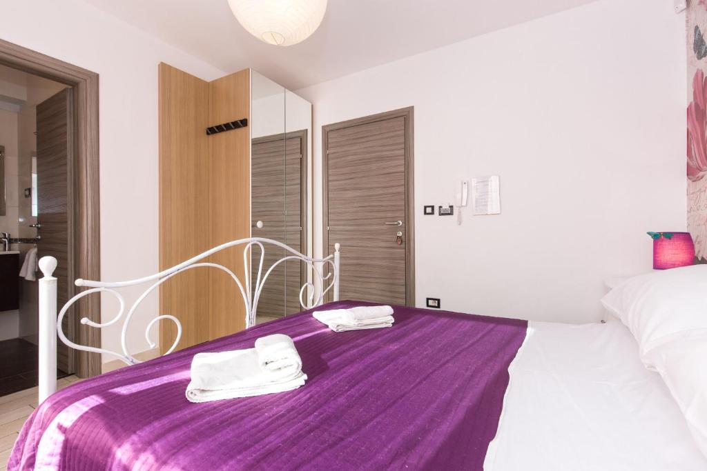 Posteľ alebo postele v izbe v ubytovaní Apartments & rooms DDD2