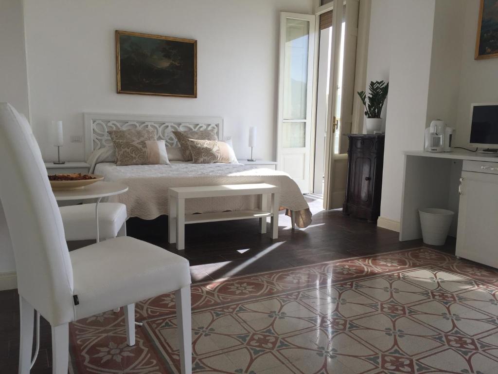 Televízia a/alebo spoločenská miestnosť v ubytovaní B&B di mare e d'azzurro