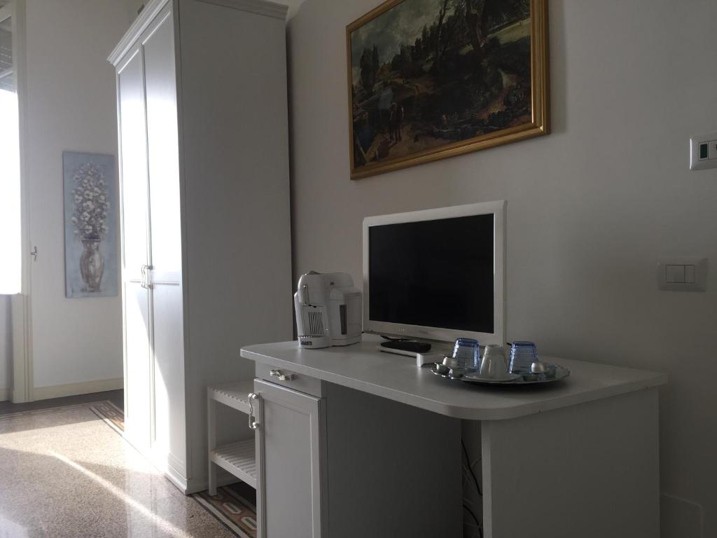 Televízia a/alebo spoločenská miestnosť v ubytovaní B&B di mare e d'azzurro