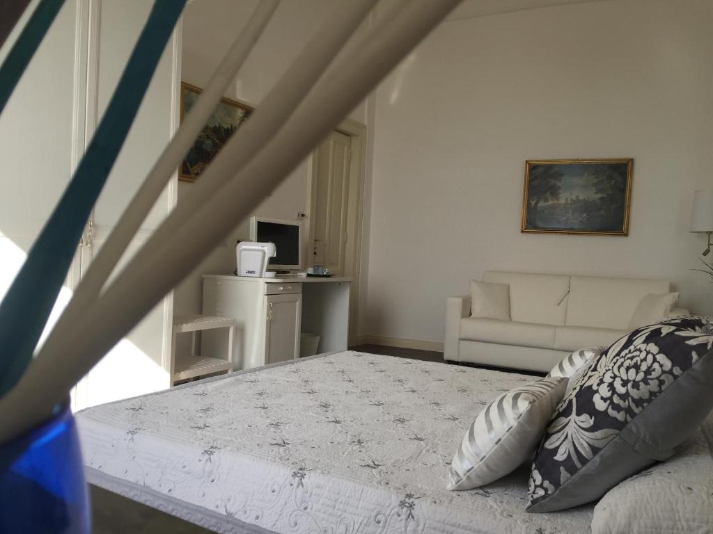 Posteľ alebo postele v izbe v ubytovaní B&B di mare e d'azzurro