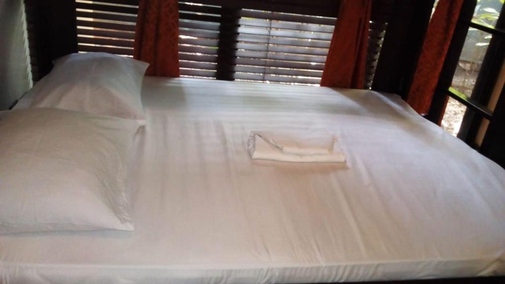 Postel nebo postele na pokoji v ubytování Cabinas surf Arribadas