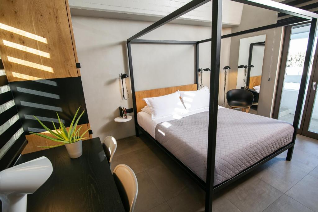 Postel nebo postele na pokoji v ubytování Marquise Suites - Adults Only