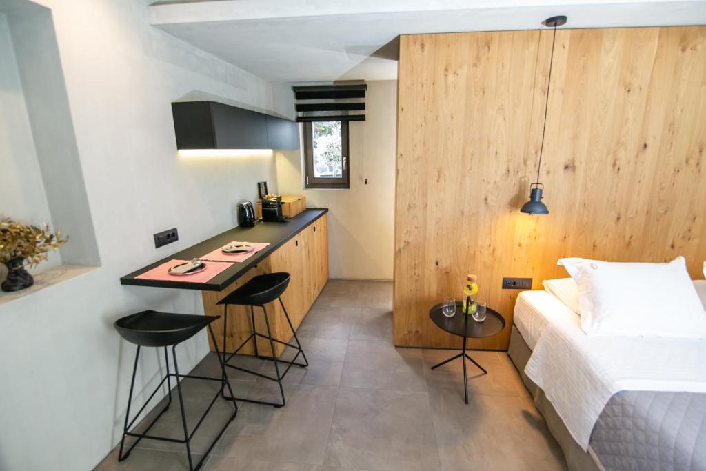 Postel nebo postele na pokoji v ubytování Marquise Suites - Adults Only