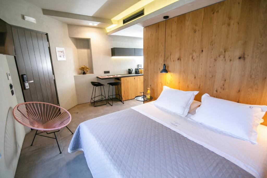Postel nebo postele na pokoji v ubytování Marquise Suites - Adults Only
