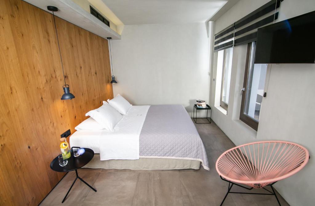 Postel nebo postele na pokoji v ubytování Marquise Suites - Adults Only