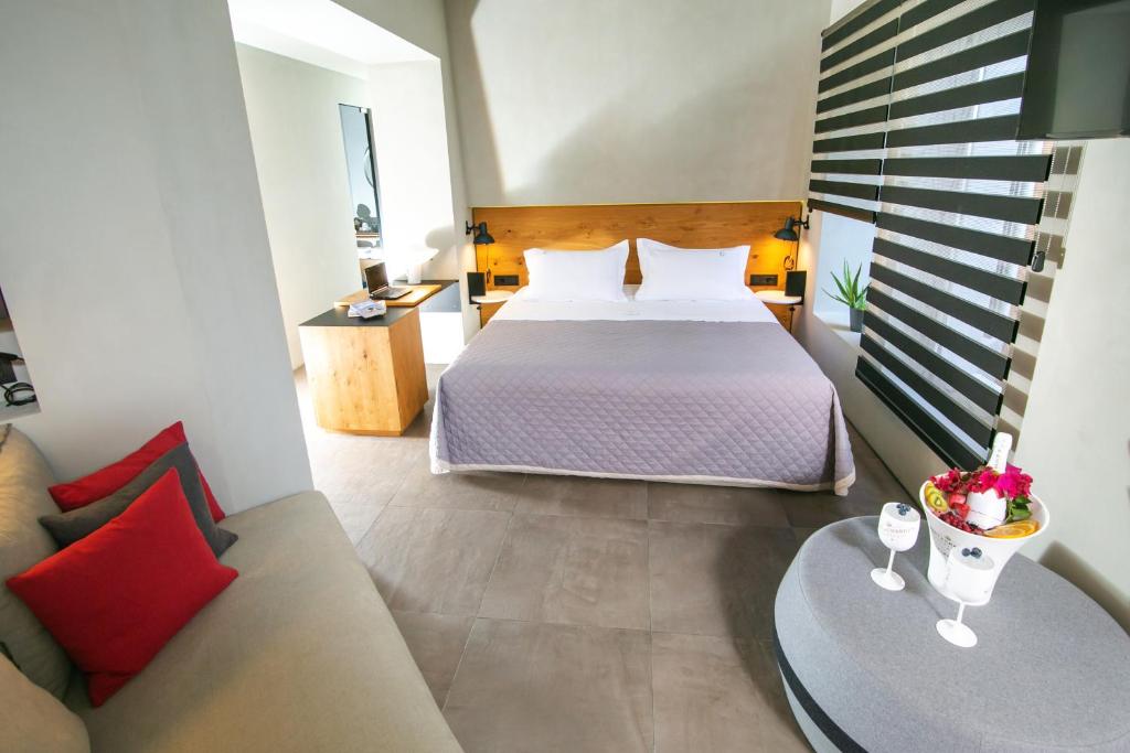 Postel nebo postele na pokoji v ubytování Marquise Suites - Adults Only