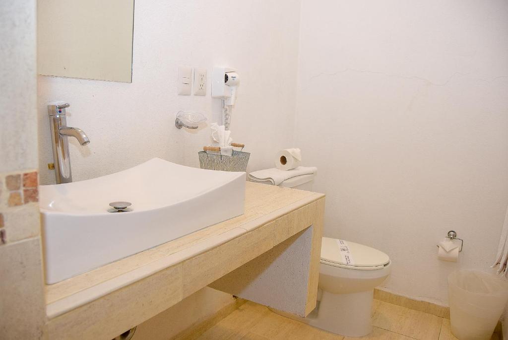 Koupelna v ubytování Hotel Real de TX